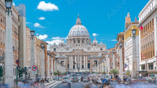 Rome, Italy, Vatican timelapse: St. Peter's Basilica in Vatican City State view from Via della Conciliazione, Road of the Conciliation. photo