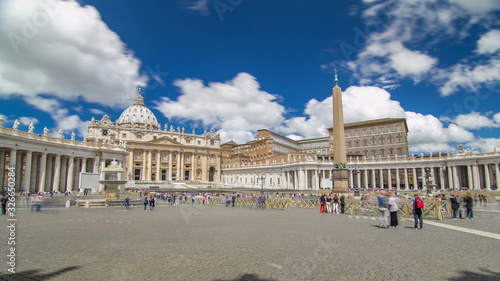 St.Peter's Square full of tourists with St.Peter's Basilica and the Egyptian obelisk within the Vatican City timelapse