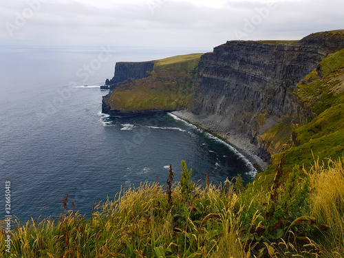 View of cliffs by the sea in Ireland 