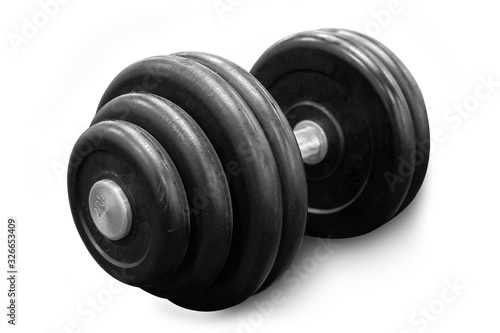 Heavy dumbbell on floor of the gym.Fitness concept.