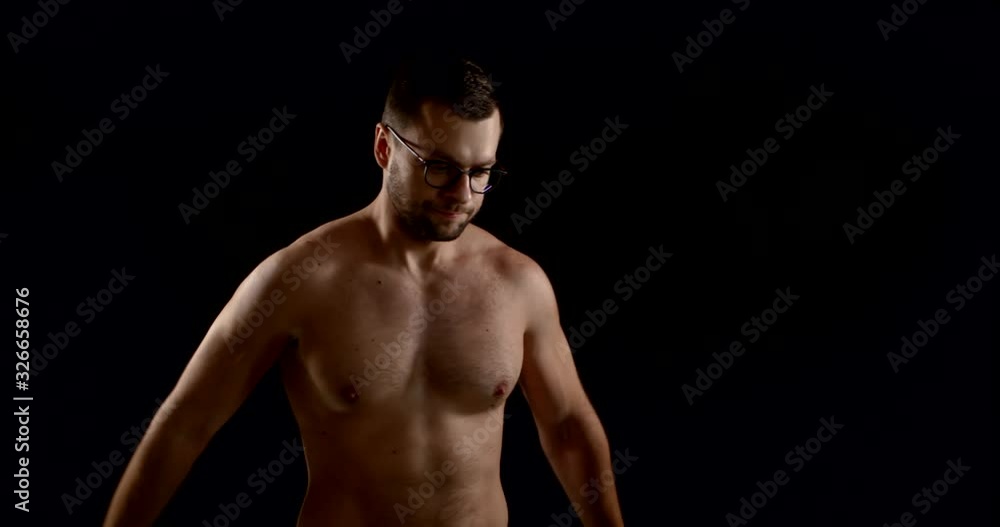 handsome sportsman is showing his sportive shape of upper body handsome sportsman is showing his sportive shape of upper body