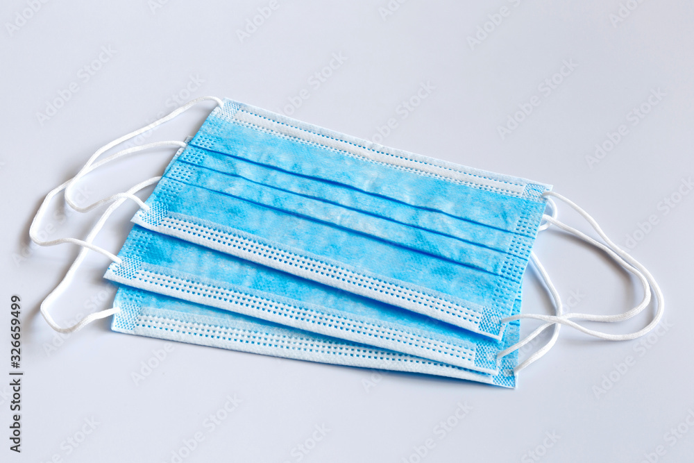 Medical masks on a light background. Medical masks on a light background.