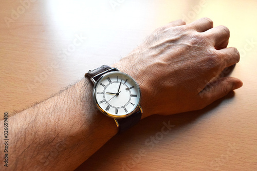 Watch on a Man’s Hand 1