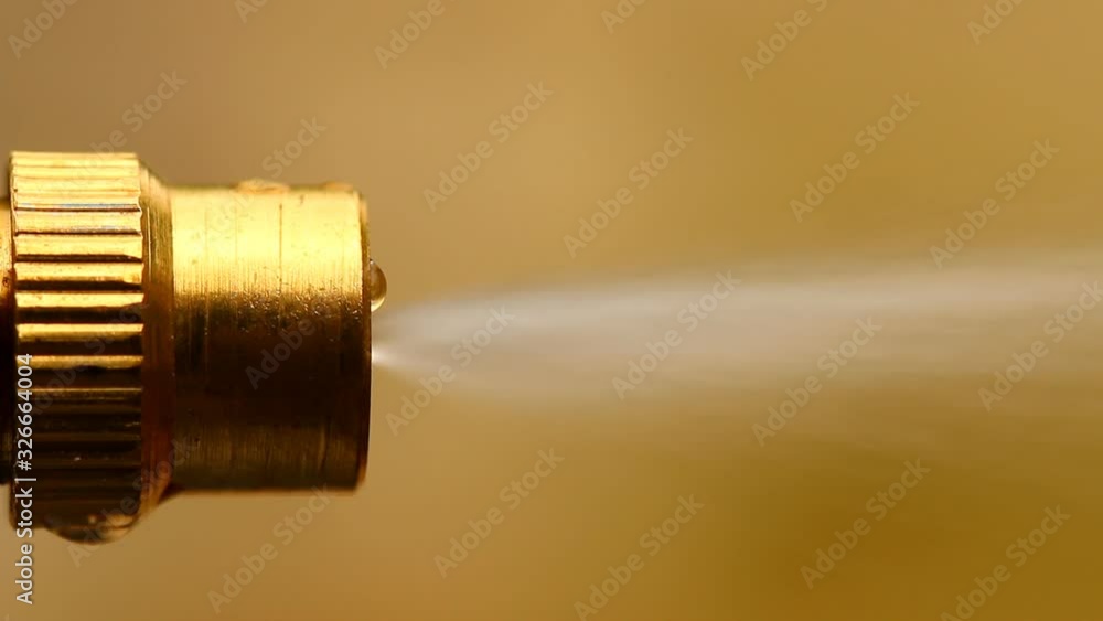 Spray nozzle spraying water , out door Chiangmai Thailand Spray nozzle spraying water , out door Chiangmai Thailand