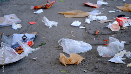  Garbage on a city street. Environmental pollution