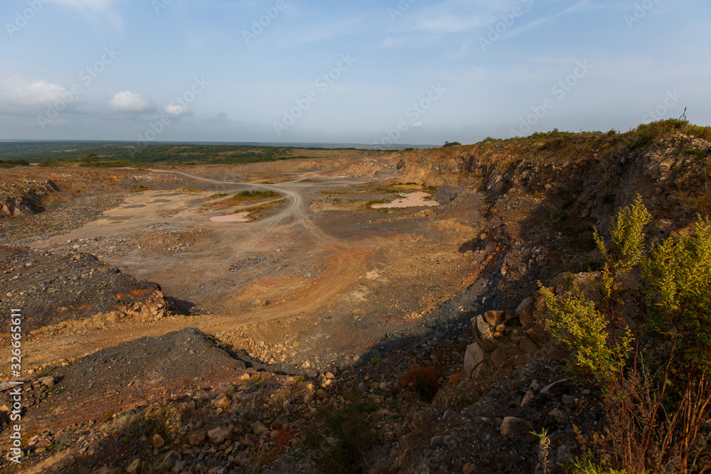 Industrial photography. Panoramic survey of a quarry for the extraction of natural stone in Russia