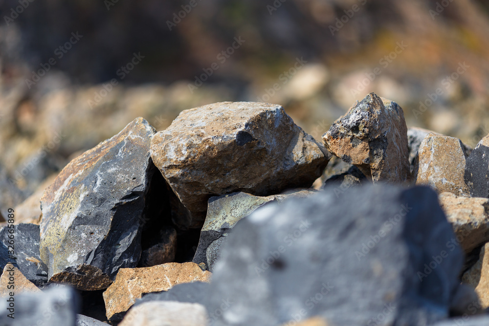 Volcanic Rocks Quarry Industrial photography. Volcanic rock at the quarry. Natural stone for ...