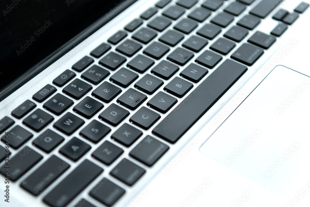 metal laptop with keyboard close up, gadget