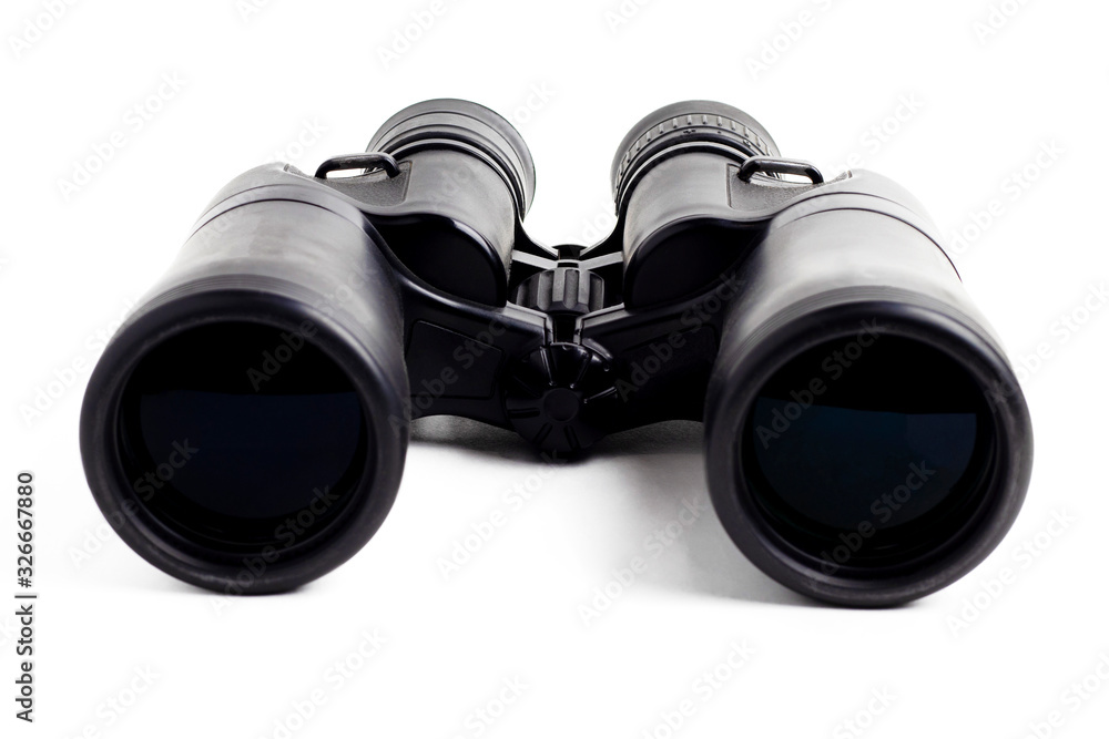 modern binoculars in black on a white background. Lenses forward. Close-up. There is no isolation modern binoculars in black on a white background. Lenses forward. Close-up. There is no isolation