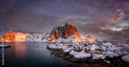 Village with snow and mountains in the Arctic, Lofoten Islands in Norway, Scandinavia photo