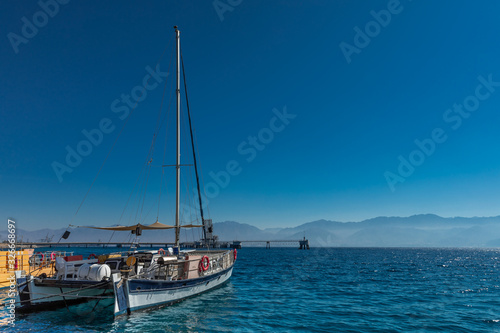  yacht in the sea against the backdrop of mountains © Thomas