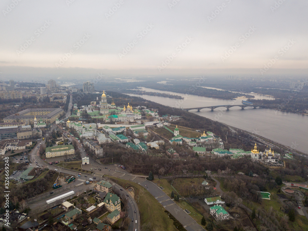 Aerial drone view. The territory of the monastery Kiev-Pechersk Lavra on a hill near the Dnieper River.