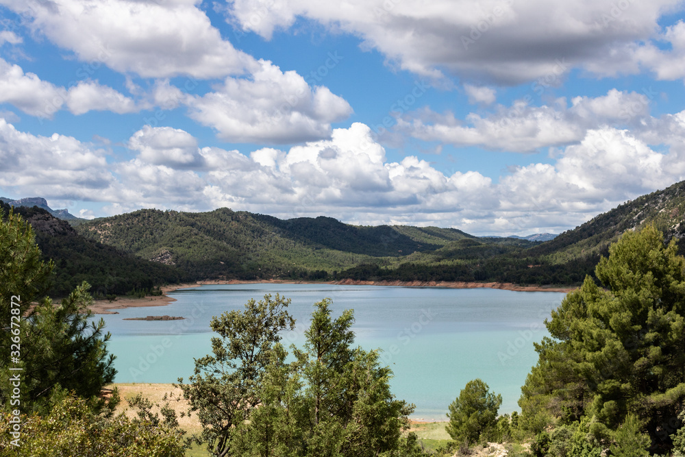 Landscape with trees and blue sky in Valderrobres, Spain Landscape with trees and blue sky in Valderrobres, Spain