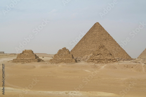 Pyramid of Menkaure and three pyramids of queens, Giza plateau, Cairo, Egypt