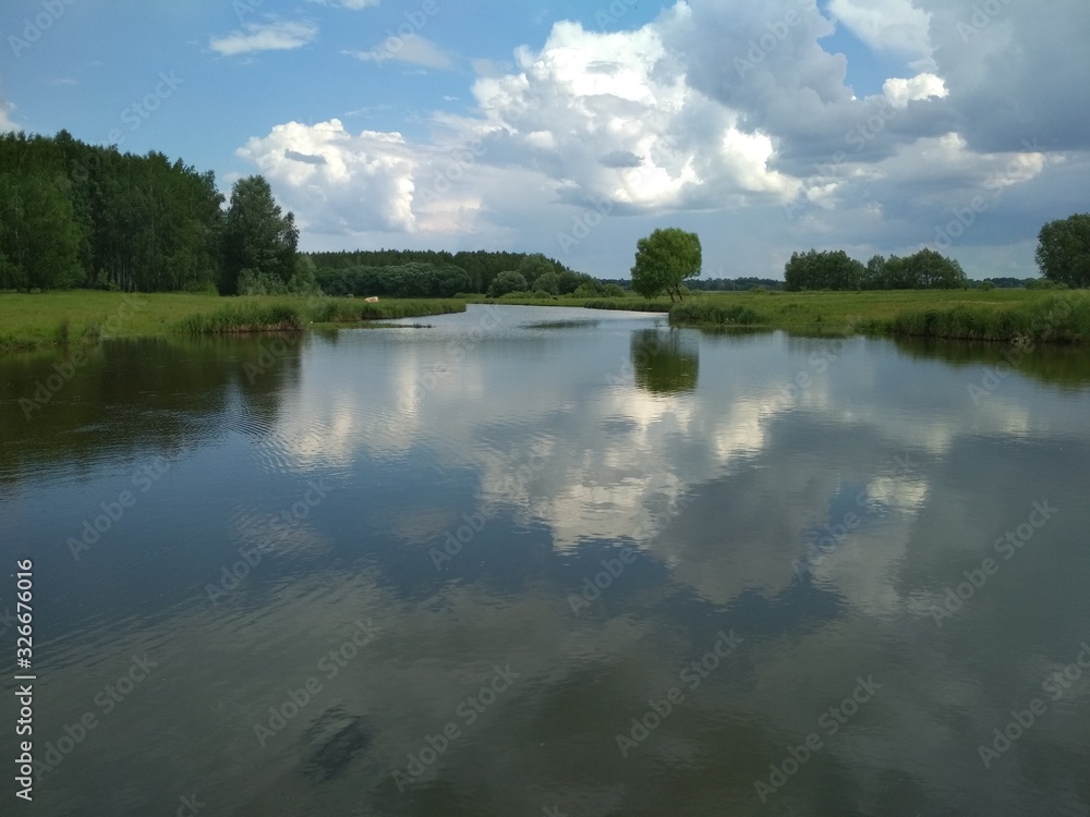 landscape with lake and clouds landscape with lake and clouds