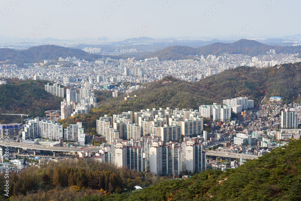 Cityscape with multi-story residential buildings in Seoul.