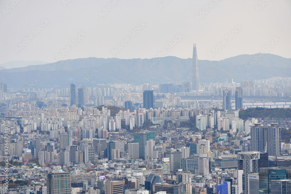 Cityscape of the Seoul in South Korea,  aerial panoramic view from the top of Inwangsan mountain.	

