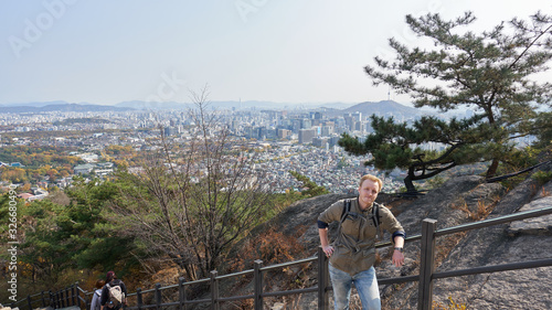 Traveller on the top of Inwangsan Mountain in Seoul in South Korea.