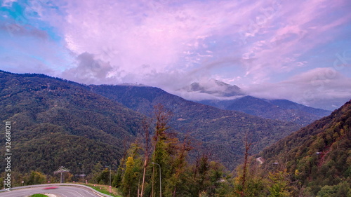 Autumn in High Mountains before sunset. Sochi, Russia. Krasnaya Polyana timelapse photo