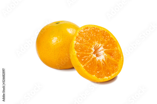 Ripe half of orange citrus fruit isolated on white background clipping path.