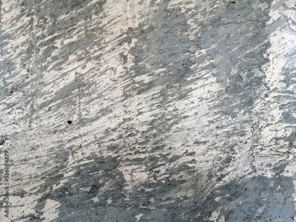 Abstract and texture of embossing on the cement surface caused by flicking the plastering trowel.
