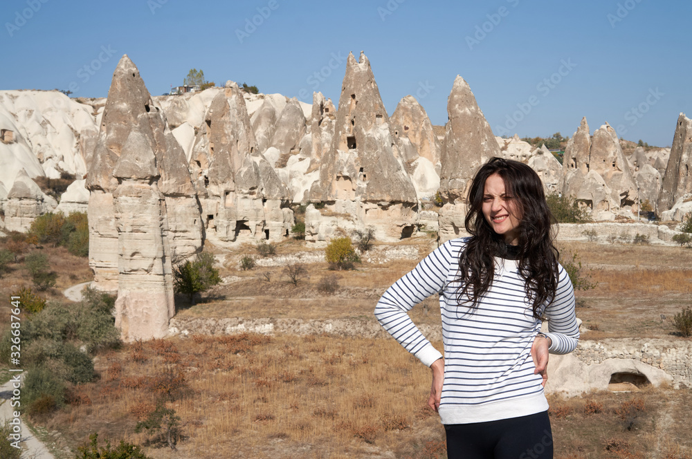 Portrait of an adorable woman with a beautiful smile in Cappadocia, Turkey.