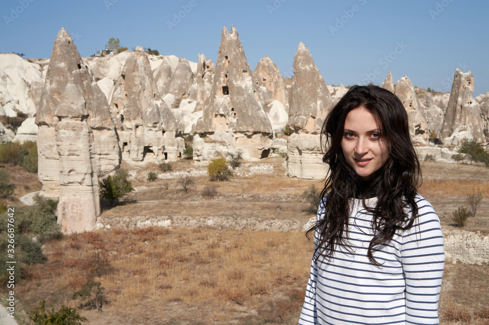 Portrait of a happy woman with a beautiful smile in Cappadocia, Turkey.
