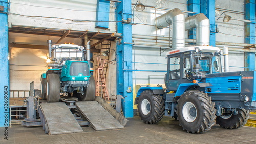 Conveyor assembly final stage of tractor at factory timelapse