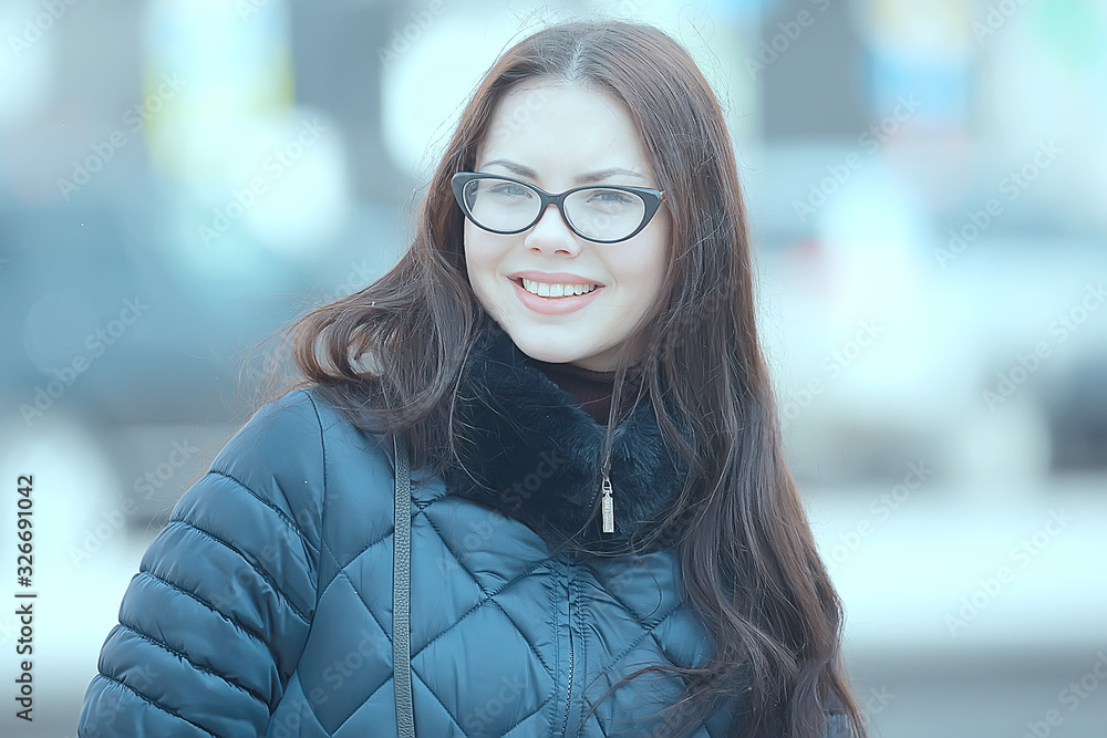 glasses winter girl snow / cold day in the city, beautiful model young woman with glasses in the cold winter glasses winter girl snow / cold day in the city, beautiful model young woman with glasses in the cold winter
