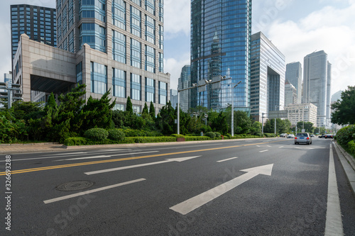 empty highway with cityscape and skyline of qingdao China.