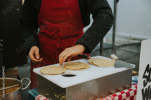 A Man Making Stroopwafel 