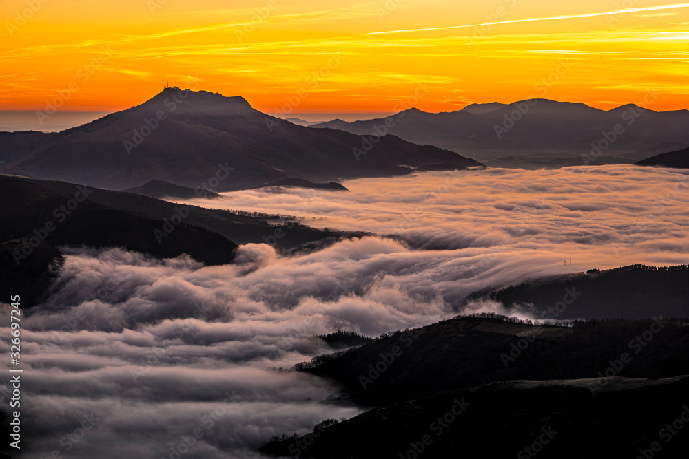 Detail of the beautiful Mount Larrun on a winter morning by the sea of clouds. Basque Country