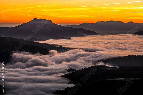 Detail of the beautiful Mount Larrun on a winter morning by the sea of clouds. Basque Country © unai