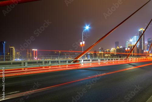 Expressway on Yangtze River Bridge and Modern City Scenery in Chongqing, China © onlyyouqj
