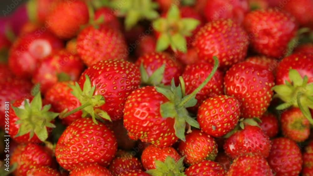 Strawberries in bowl in closeup Strawberries in bowl in closeup
