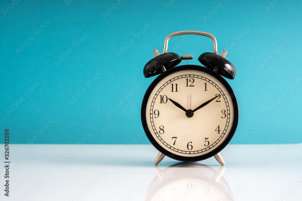 Clock with blue background with puntuality concept. Clock with blue background with puntuality concept.