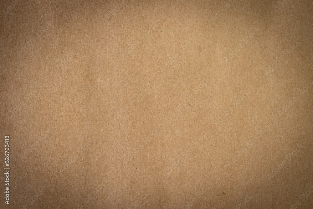Brown paper, craft abstract background. Retro, old antique vintage paper art pattern texture background. Detail paperboard texture of pattern with free space copy for text, vignette effect. Brown paper, craft abstract background. Retro, old antique vintage paper art pattern texture background. Detail paperboard texture of pattern with free space copy for text, vignette effect.