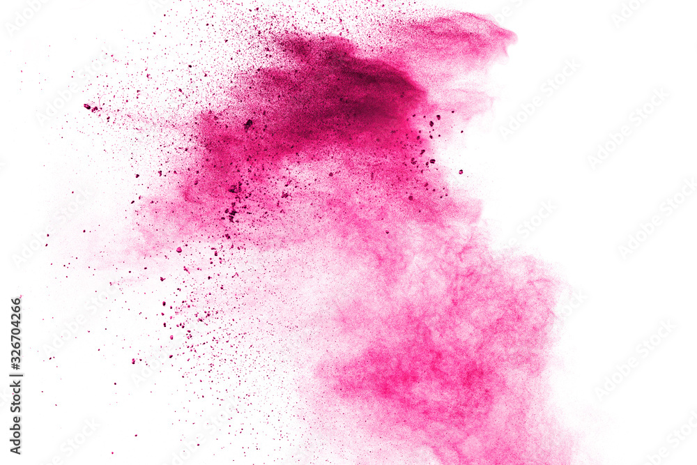 Abstract deep pink powder explosion on white background. Freeze motion of deep pink powder splash.
