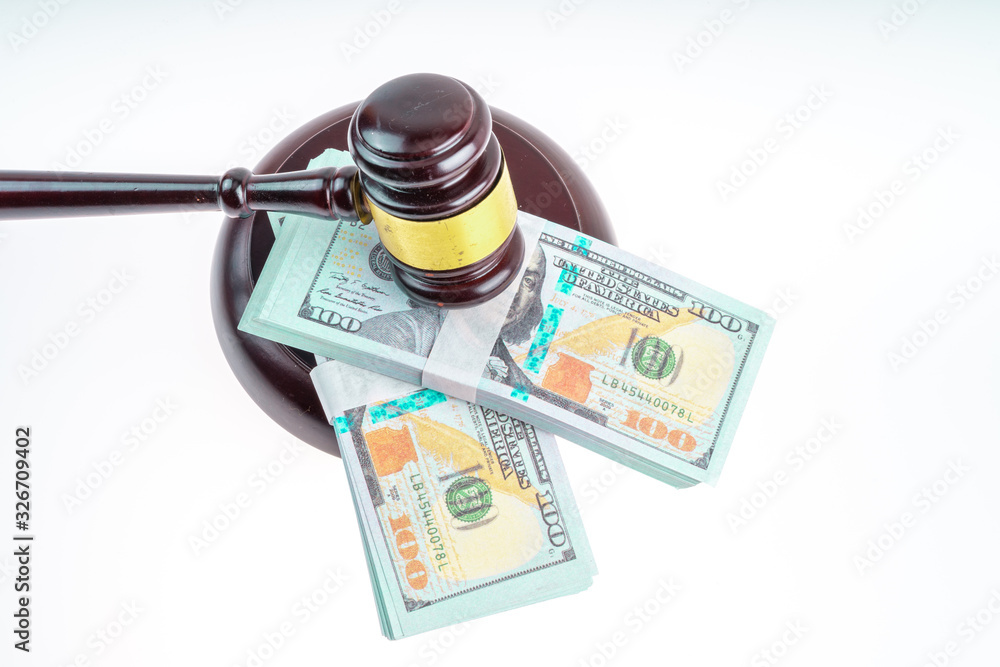 Gavel hammer and banknote with white background