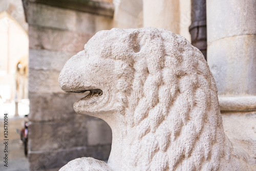 Lion sculpture of cathedral of Saint Mary of the Assumption and Saint Geminianus. Modena, Italy. Il Duomo photo