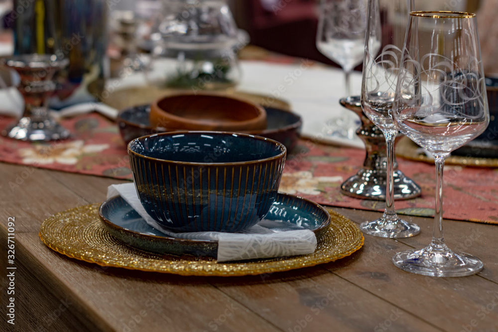 Fototapeta premium Green tea mug on table. Fron view. Holiday.