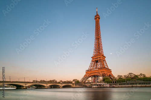eiffel tower in paris at sunset © JorgeIvan