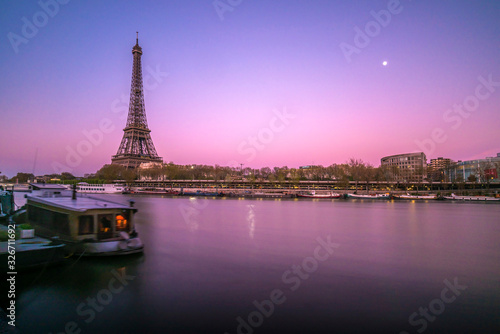 eiffel tower in paris at sunset © JorgeIvan