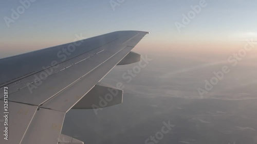 Airplane wing in the sky