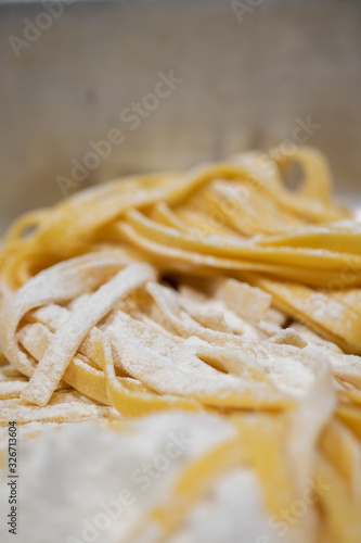 fresh pasta on kitchen table.