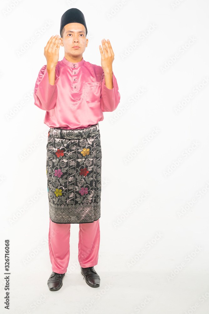 Teenager wearing traditional costume with posture of pray step. Stock ...