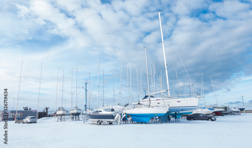 boats in harbour in winter time