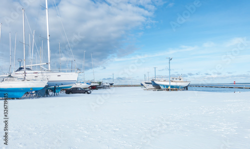 boats in harbour in winter time © Urmas