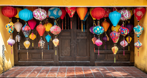 The entrance to the building is decorated with many beautiful lanterns
