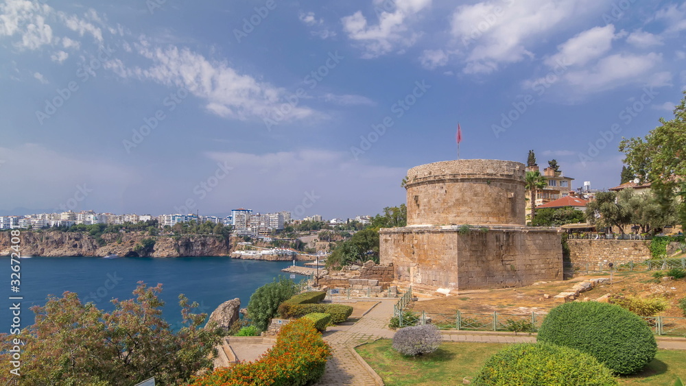 Hidirlik tower in Kas town in Antalya timelapse  with view of harbor marine bay is a old city